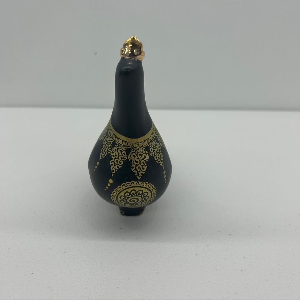 Haft-ta Iqbal ceramic pigeon figurine
with Gold Accents